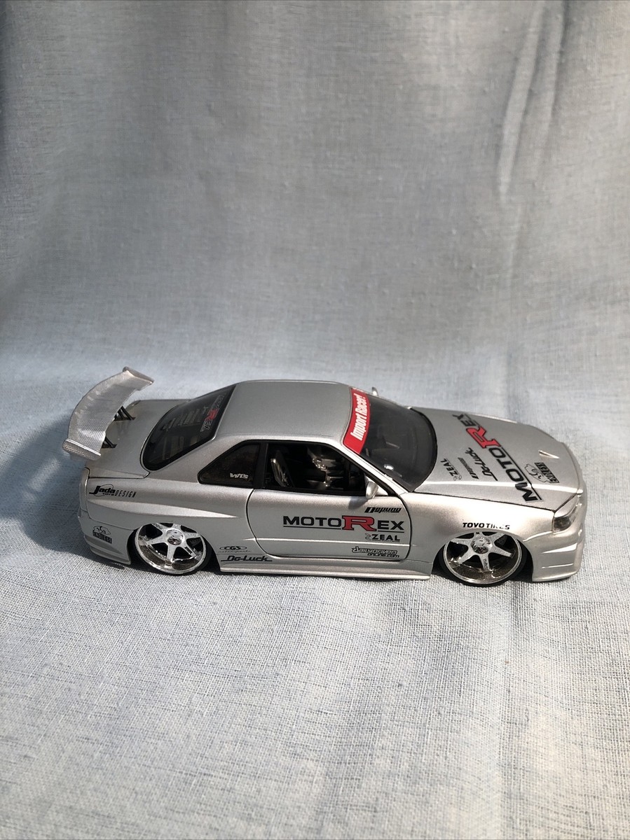 Jada Toys 1:24 Import Racer Nissan Skyline R34 GTR Gray Do Luck